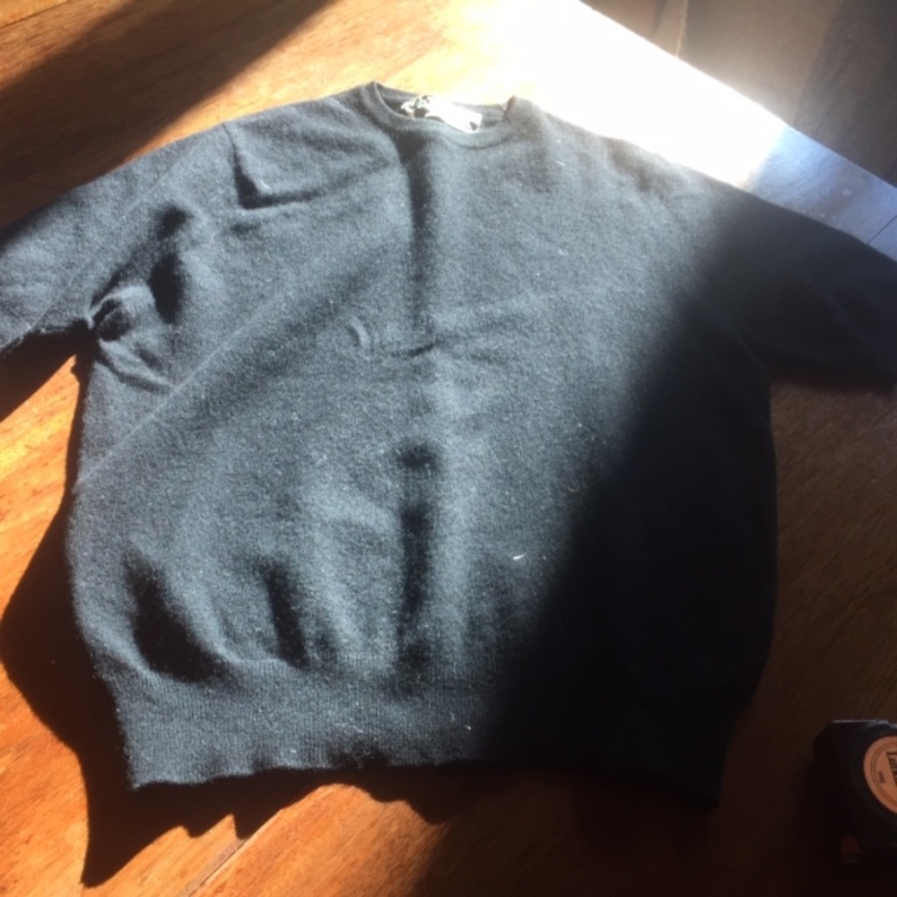 Black short-sleeve wool sweater